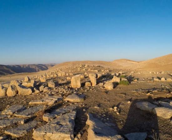 Ceremonial gathering site in Murayghat, Jordan, showing different lines of standing stones. 