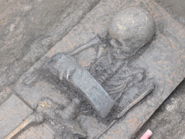 One of the two child burials which contained large bronze belts