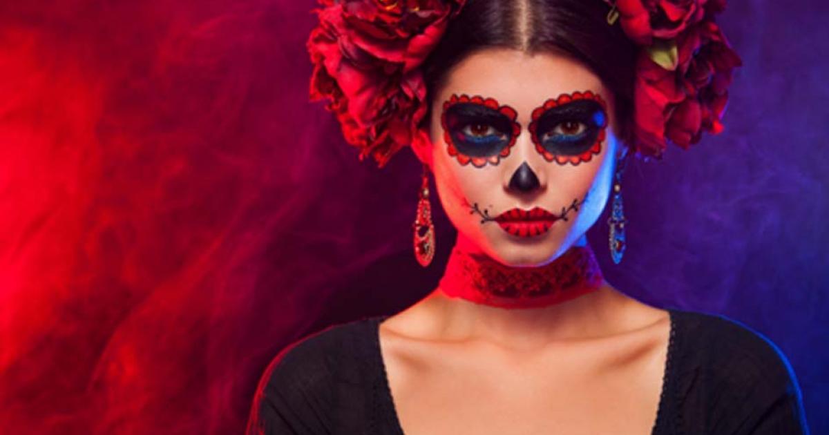 Lady dressed up as La Catrina for Dia de los Muertos.