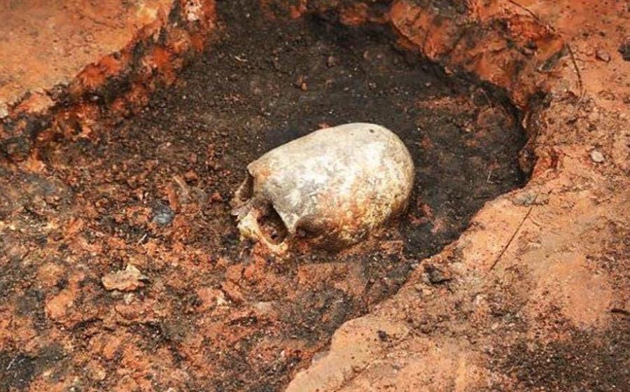 Elongated skull being unearthed, Arkaim, Russia 