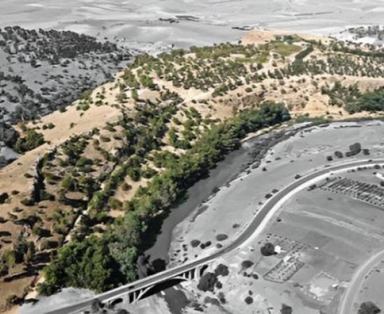 Aerial photograph of the Oued Beht ridge and river, highlighted in color.
