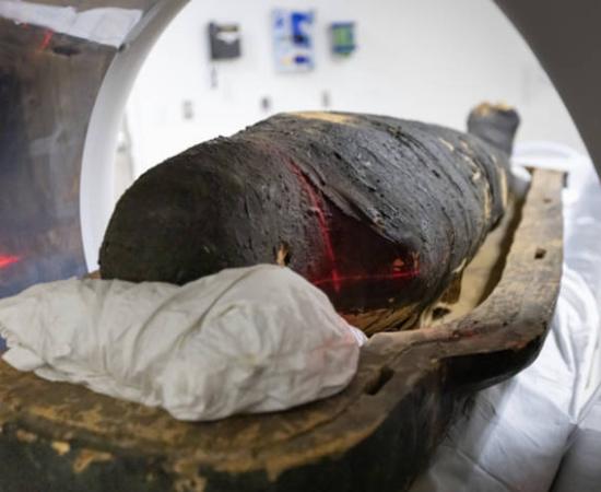 ancient Egyptian mummy Nes-Hor inside the CT scanner at USC.