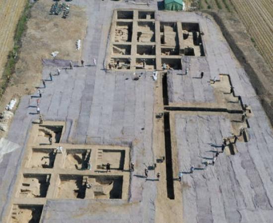 Excavation of one of the platforms, indicating its exceptional scale, making it useful for large, communal gatherings.