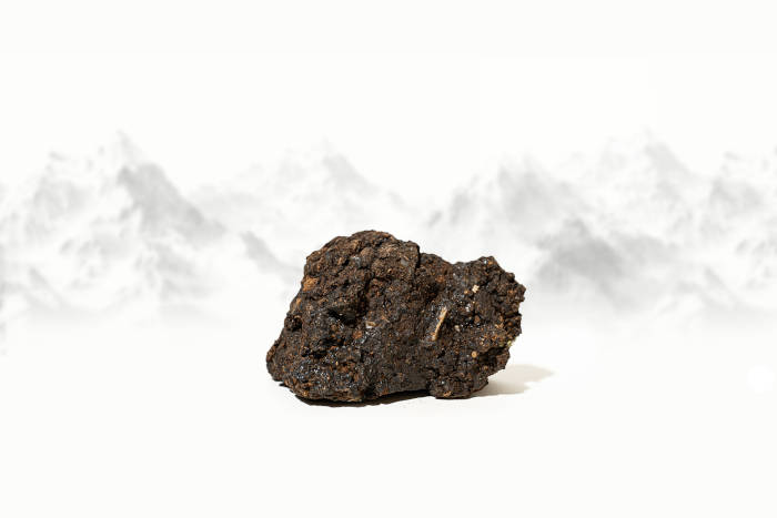 A piece of shilajit in its natural form.