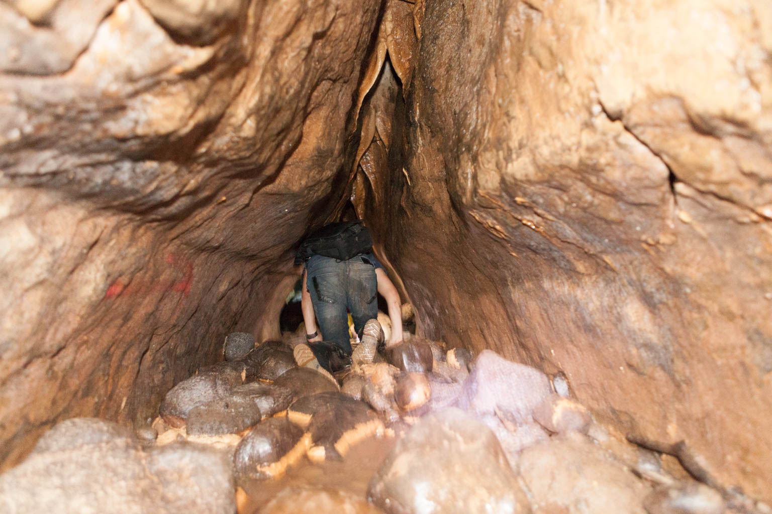 Crawling into a tunnel of Tayos Caves