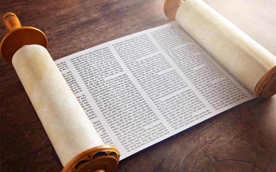 The Sefer Torah, or Toral scroll, is a handwritten copy of the Torah Pentateuch, used for ritual Torah readings, known as parashah. Source: pamela_d_mcadams / Adobe Stock
